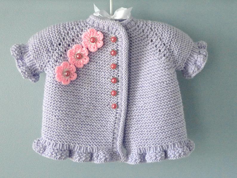 Crochet baby girl lilac cardigan with flowers and ruffle hem