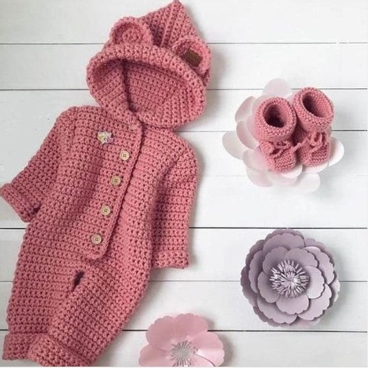 Handmade crochet baby girl hooded romper and booties set in dusty pink with bear ear detail