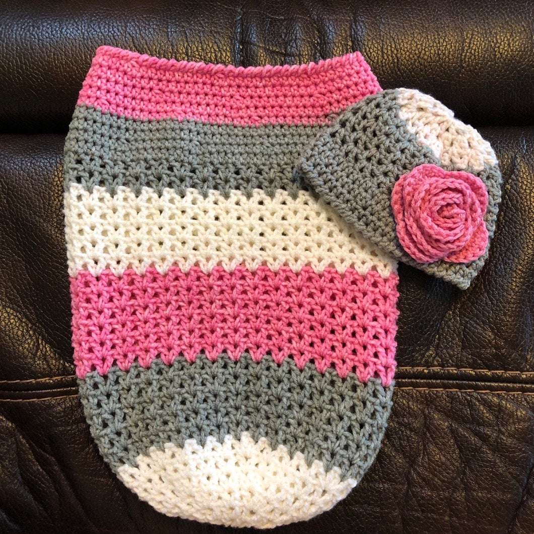 Handmade crochet baby girl striped cocoon and hat set in pink, grey and white with floral detail