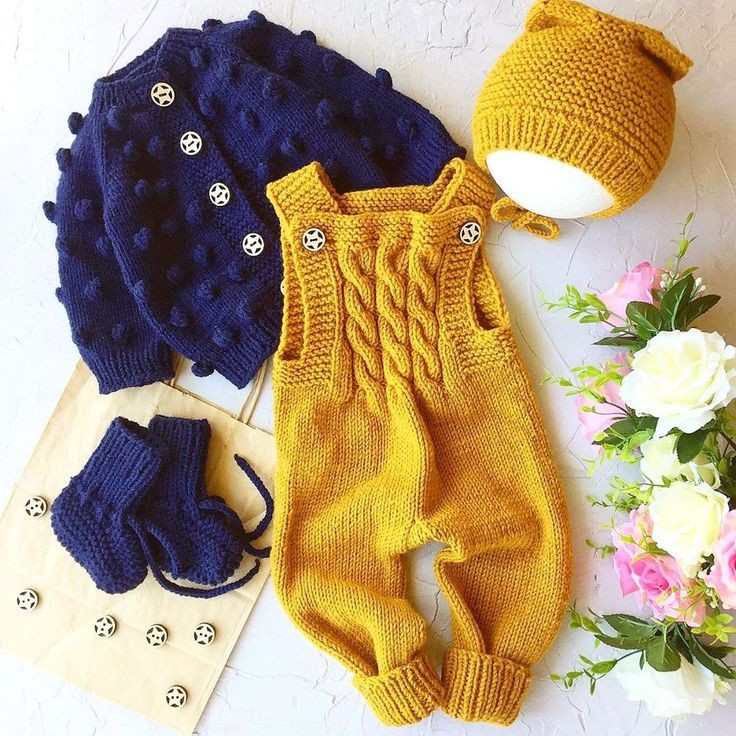 Handmade crochet baby sweater and dungaree set with hat and booties in navy and mustard