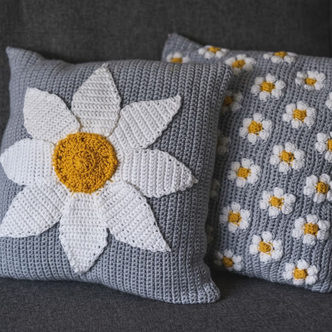 Crochet cushion cover with a lily-inspired design