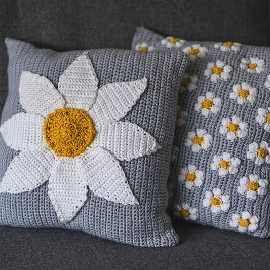 Crochet cushion cover with a lily-inspired design