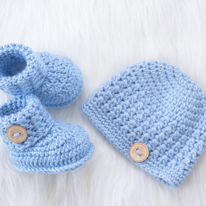 Handmade crochet baby blue cap and booties set