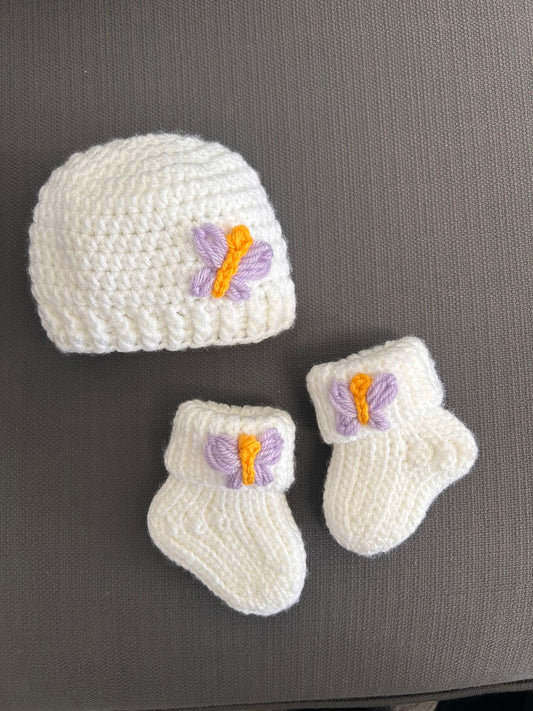 Handmade crochet baby butterfly cap and booties set