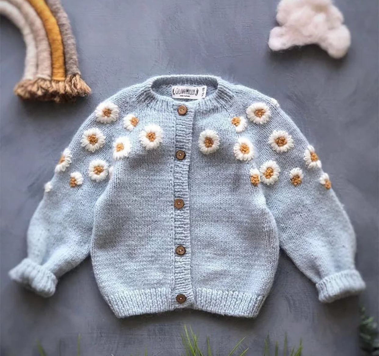 Crochet baby daisy cardigan in light blue