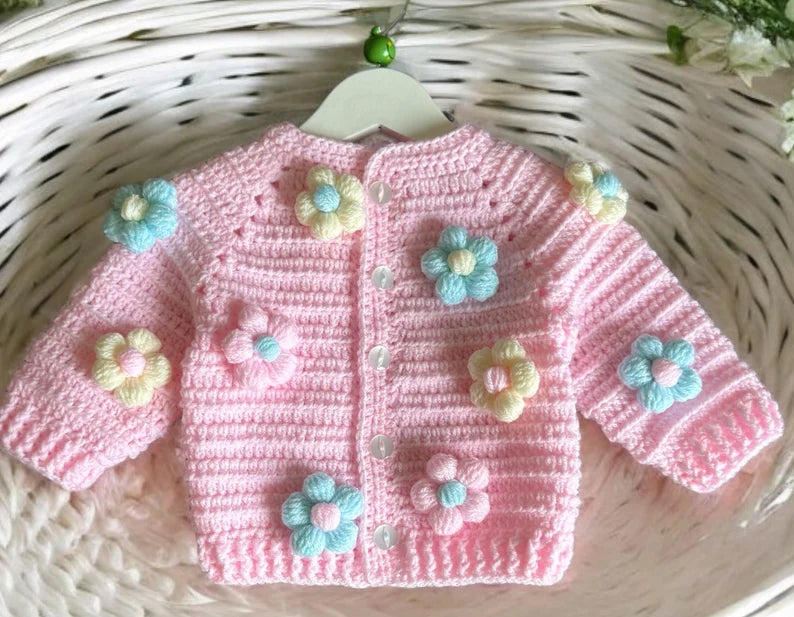 Crochet baby floral cardigan in pink and white