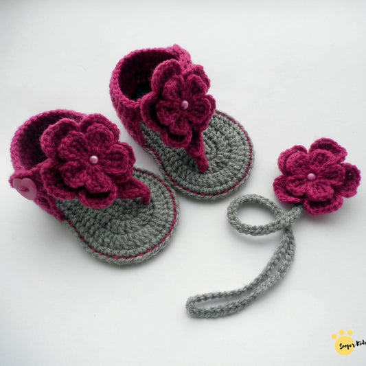 Handmade crochet baby girl flower sandals and matching headband in grey and magenta with flower detail