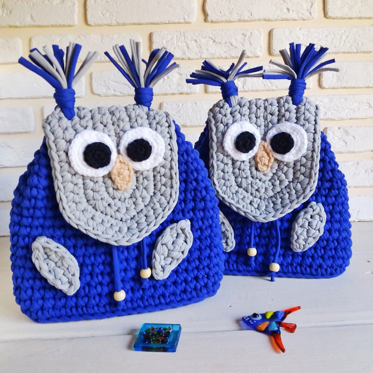 Crochet baby owl backpack in blue with owl face