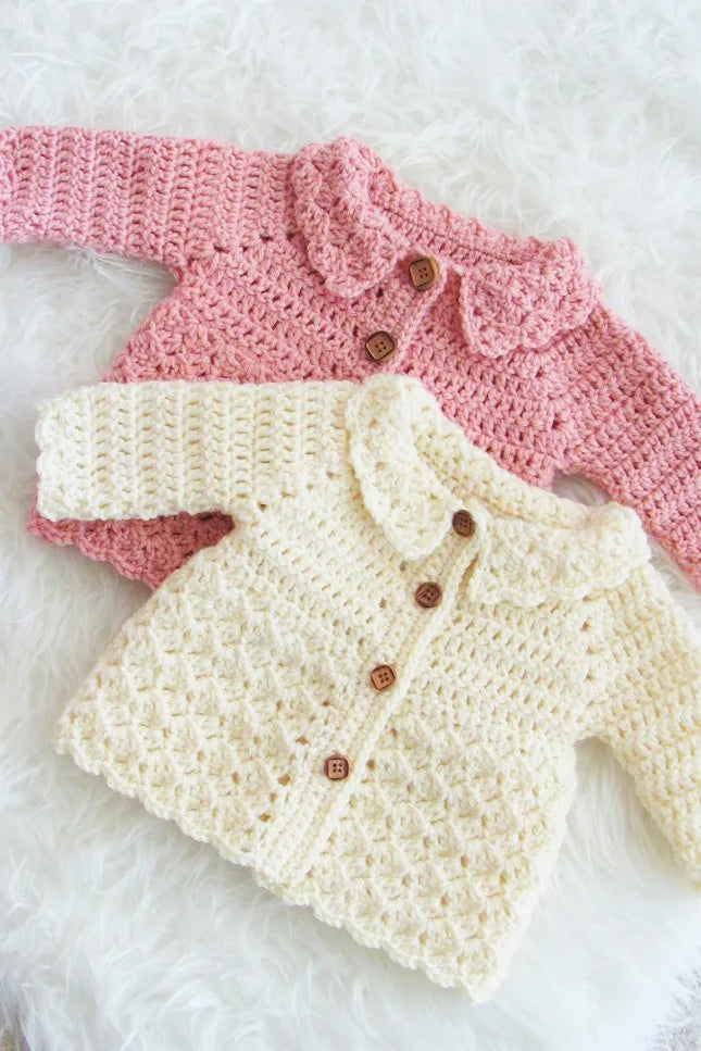 Crochet baby buttoned cardigan in pink and off white