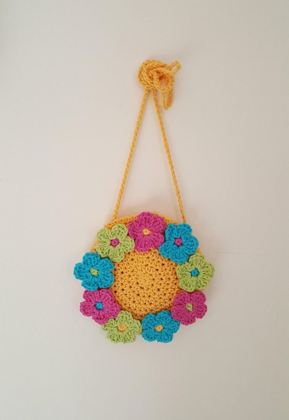 Crochet baby flower backpack, round bag with colourful flowers