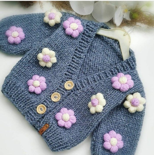 Crochet baby girl denim blue cardigan with pink and white flowers