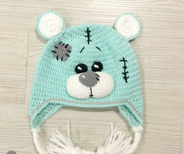 Crochet baby bear cap in mint green with bear ears