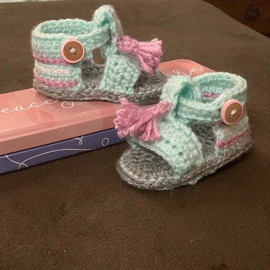 Mint and grey crochet baby sandals with pink tassels