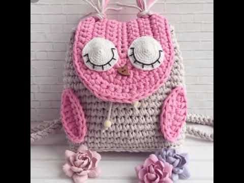 Crochet baby owl backpack in pink and grey with sleepy owl face
