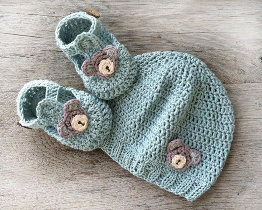 Crochet baby cap and booties set in sage green with small flowers