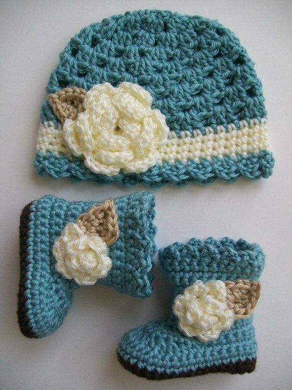 Crochet baby cap and booties set in teal with cream flowers