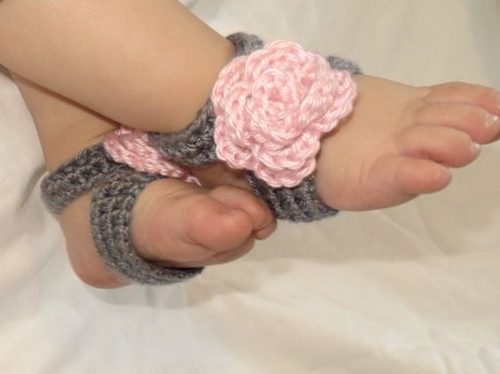 Pink crochet rose on grey strap barefoot baby sandals