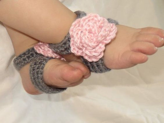 Pink crochet rose on grey strap barefoot baby sandals