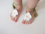 White crochet barefoot baby flower sandals with green vine straps