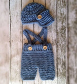 Handmade crochet baby boy suspender shorts and cap set in steel blue