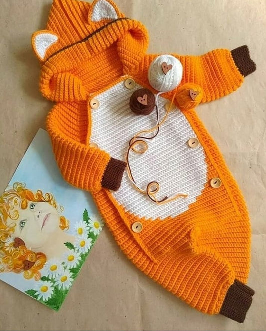 Handmade crochet baby fox hooded romper in orange and brown with ear detail