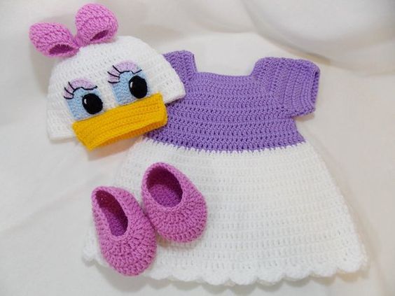 Handmade crochet baby girl dress set with duck hat and booties in purple and white