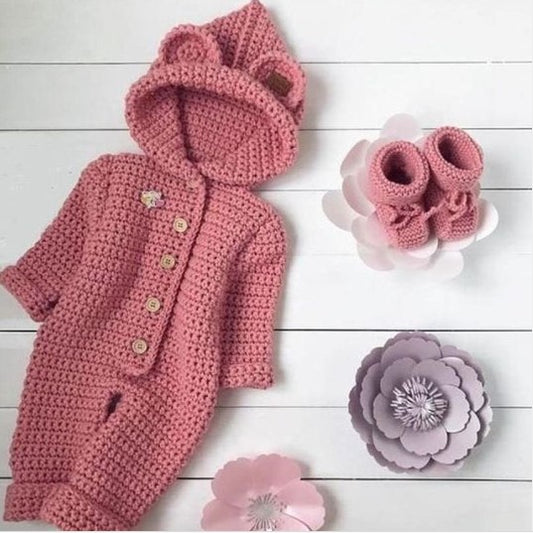 Handmade crochet baby girl hooded romper and booties set in dusty pink with bear ear detail