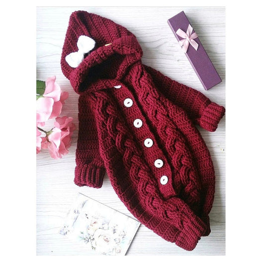 Handmade crochet baby girl hooded romper with bow detail in maroon