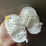 Handmade crochet baby girl pearl sandals in white with pearl and rhinestone detail