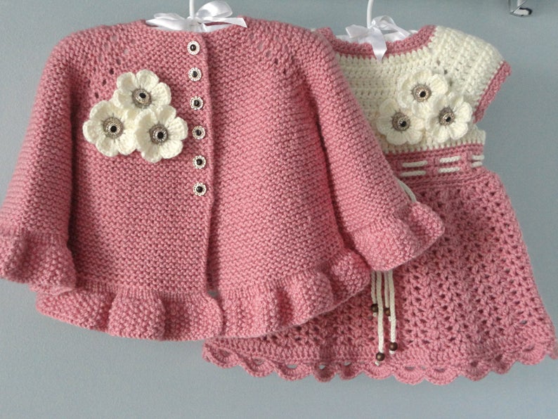 Handmade crochet baby girl ruffle cardigan and dress set in pink and cream with floral detail